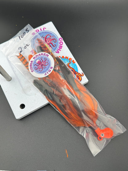 Orange and black cobia jig cobiakrakenjigs.com